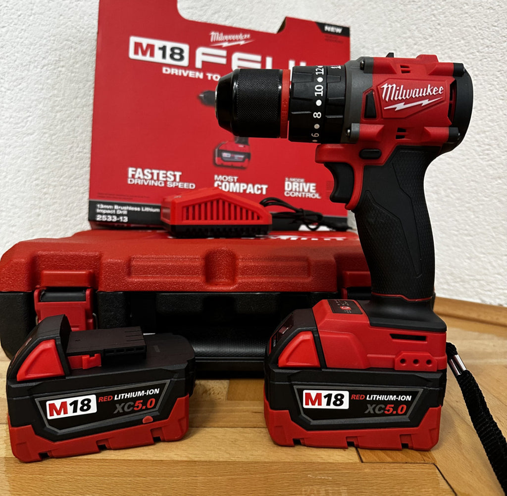 Milwaukee M18 Aku Udarna Bušilica 21V (2x5.0Ah)